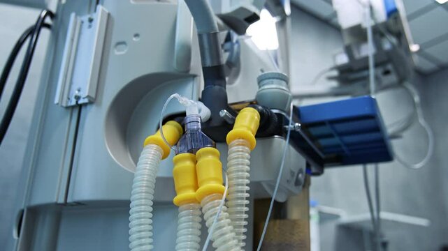 Tubes of the artificial lung ventilating machine. Low angle view on the advanced medical equipment. Close up.