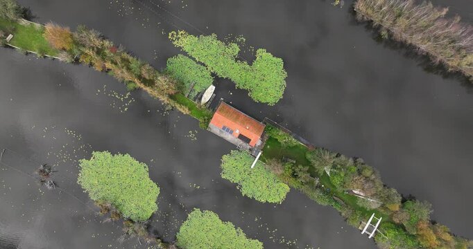 Small recreational houses at Scheendijk, water and recreational area, Loosdrechtse plassen. Aerial drone video