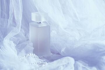 Elegant perfume bottle surrounded by soft, delicate white tulle fabric and pearls, dreamy and luxurious atmosphere with a subtle pastel color palette.