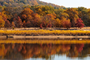 Looking across the Wisconsin River at Prairie du Sac to the eastern shoreline of sand and oak trees