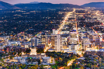 Aerial view of Utah State Capitol and Salt Lake City skyline at dusk. Salt Lake City, is the capital and most populous city of the U.S. state of Utah
