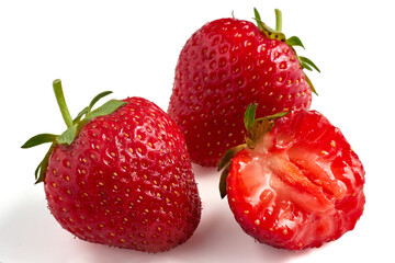 ripe juicy strawberries isolated on white background. two whole berries and one bitten