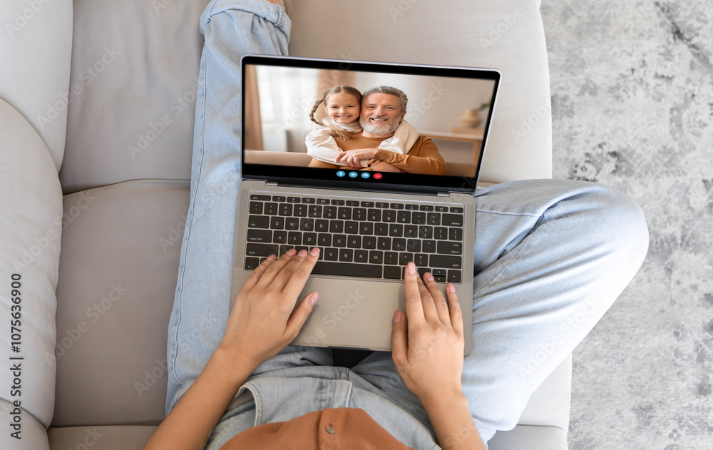 Poster a person sits comfortably on a couch using a laptop for a video call with a smiling relative. the wa
