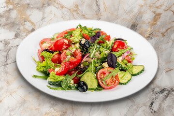 Caesar fresh ripe Salad with vegetables in plate