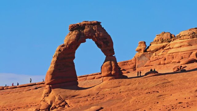 Delicate Arch in Arches national park, Utah, with panning motion. Delicate Arch is a 16m freestanding natural arch located in Arches National Park, near Moab in Grand County, Utah, United States