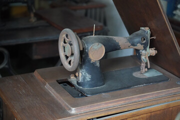 antique and dirty black and brown sewing machine on wooden sewing machine table, object, technology, work, decor, copy space