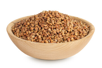 Raw buckwheat in wooden bowl isolated on white background