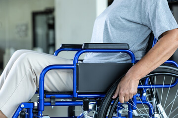 Close up picture of a woman in a wheel-chair