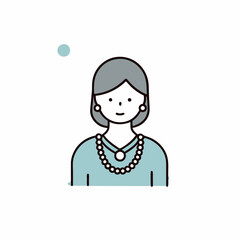 A woman wearing a blue shirt and a necklace. She is smiling. The necklace is made of pearls