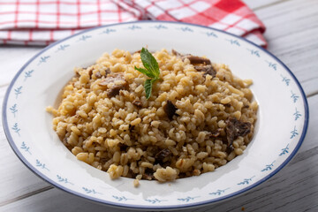 Turkish foods; Bulgur pilaf with mushrooms (Turkish name; mantarli bulgur pilavi)
