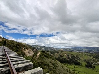 Stunning uphill mountain view in abandoned train tracks