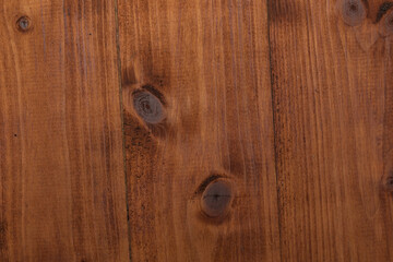 Elegant dark wooden panel with distinctive knots and deep rich textures