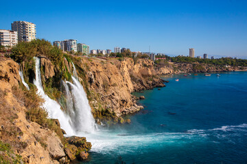 Waterfall Duden (Karpuzkaldiran selalesi) falling into the Mediterranean sea. Waterfall falling...