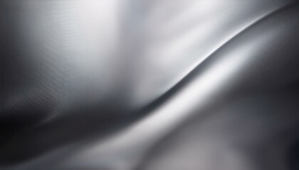 シルバーグラデーションのテクスチャ背景。暗いシルバーから明るいシルバーへと移り変わる、洗練された光沢感が魅力的。
