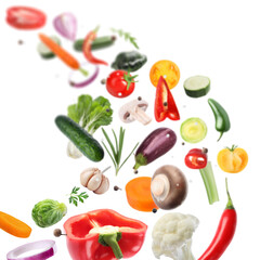 Fresh vegetables, herbs and spices in air on white background
