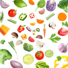 Fresh vegetables and herbs in air on white background