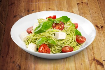 Dinner with plate of tasty Spaghetti with sauce