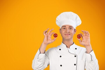 Young smiling chef cook man posing