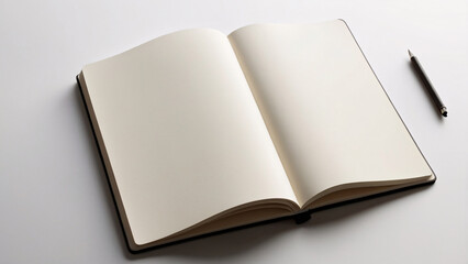 Fototapeta premium Open blank notebook with pen on desk. An open blank notebook with cream-colored pages lies on a white desk, accompanied by a black pen, symbolizing creativity and writing. 