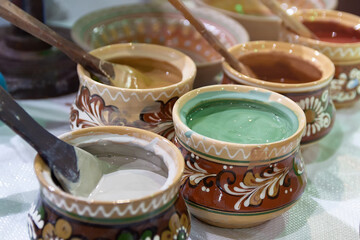 Clay pots are handmade with colorful paint. Vasylkivska majolica