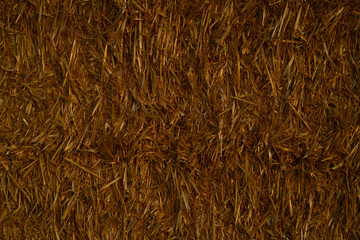 Hay texture. Hay bale. Pile of golden yellow hay. Haystraw for background. Farm. Stack of hay. Autumn background.