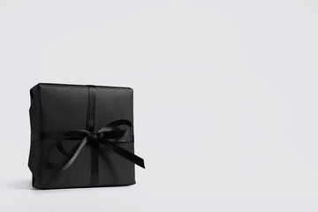 Black gift box on white background