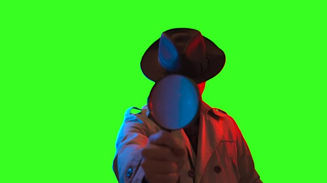 private retro detective spy in noir style concept of investigation and search  on green background
