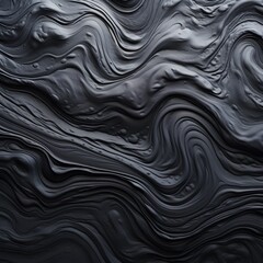 Abstract black textured surface with flowing, wavy patterns.