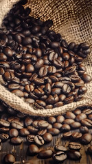 A close-up of roasted coffee beans scattered on burlap, highlighting their rich brown texture and inviting aroma.