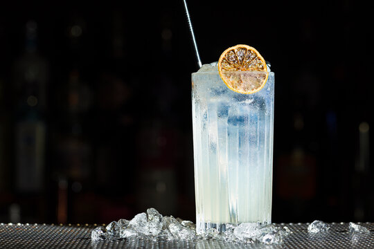Refreshing gin fizz cocktail with a twist of citrus