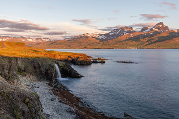 Waterfall feeding into the sea in Iceland