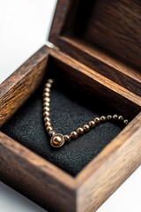 An Elegant Gold Necklace beautifully presented in a charming Wooden Box as a perfect gift