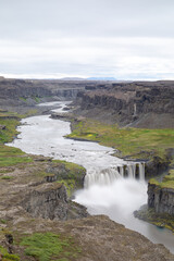 Large waterfall in Iceland from cliffs