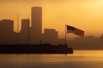 Obraz premium A silhouette of a city skyline at sunset with an American flag in the foreground.