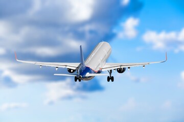 Commercial passenger modern airplane flying in sky