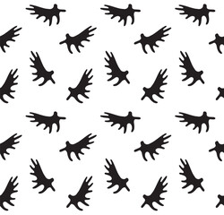 Vector seamless pattern of hand drawn sketch doodle moose horns silhouette isolated on white background