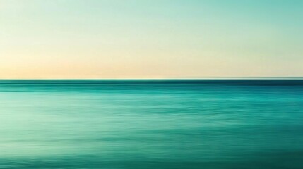 Obraz premium A boat floating on a vast expanse of water beneath a pale blue sky