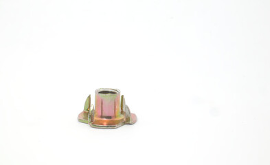 Front view of a tee nut on a white background. Component part of mechanical or woodworking.