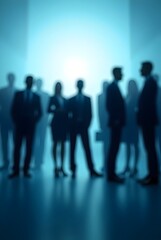 Silhouettes of people standing, business concept, blurred blue background, teamwork and unity