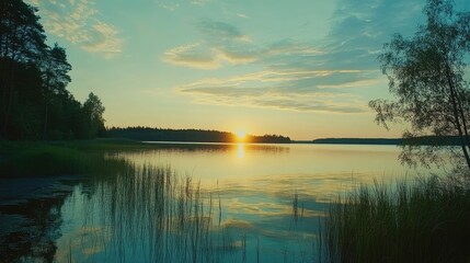 Obraz premium sunset at coast of the lake. Nature landscape.