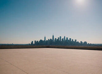 Concrete Sidewalk with City Skyline in the Background: Urban Landscape