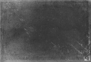 Abstract dirty or aging film. Dust particle and grain texture or dirt use for overlay film frame effect. Dust scratches effect for vintage film grunge textured effect design.