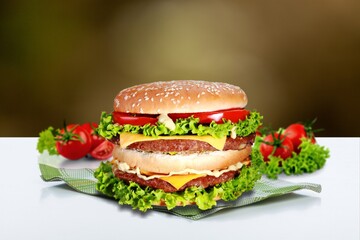 Tasty fresh cheeseburger with beef patty