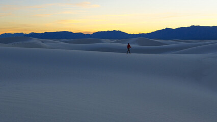 Person walking at White Sands National Park in New Mexico, USA