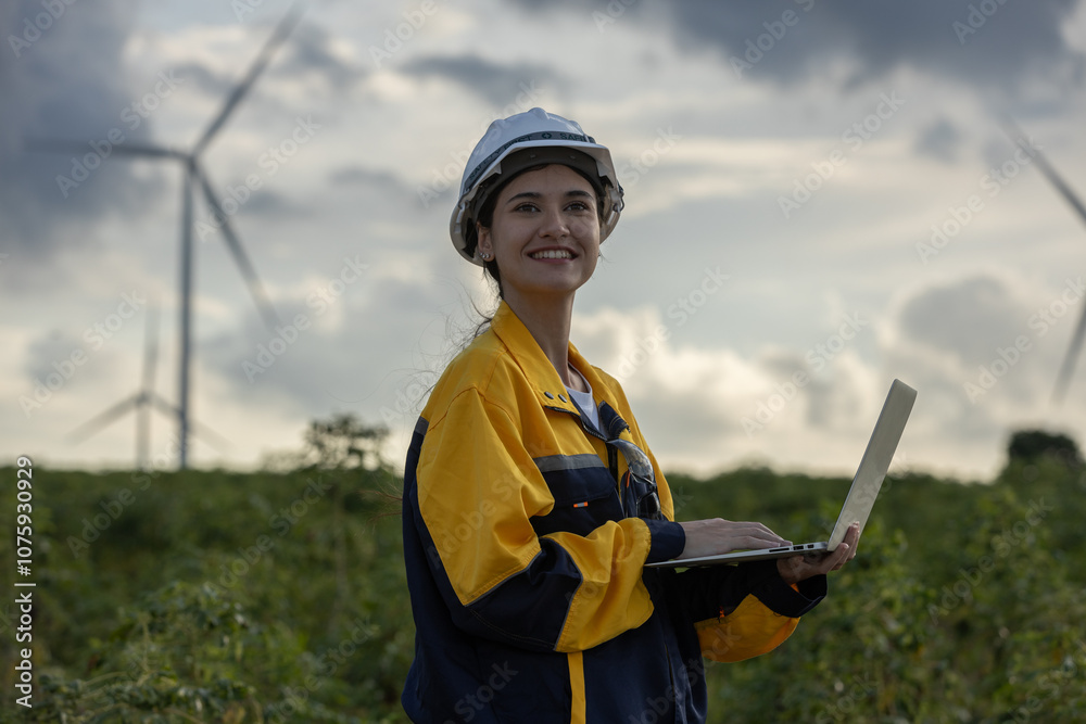 Aufkleber renewable energy systems concept, engineer female using laptop working wind turbine for alternative 