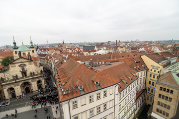 Prague panorama with colorful rooftops on a cloudy day