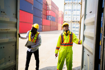 Custom officer is performing the inspection in container yard.
