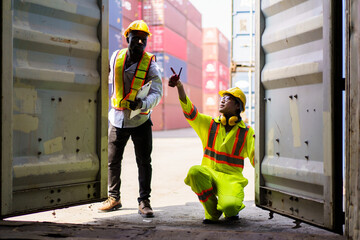 Custom officer is performing the inspection in container yard.