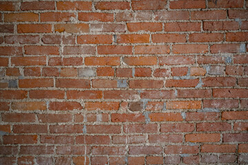 old red brick wall with plaster