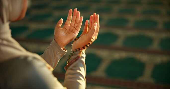 Islam, woman and hands in Mosque for prayer, faith and spiritual reverence for worship. Muslim person, religion or open palms for dua with respect, devotion or meditation for Ramadan with mindfulness